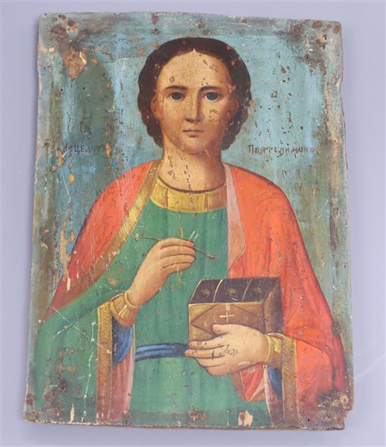 A late 19th century Russian painted wood icon 23 x 17cm